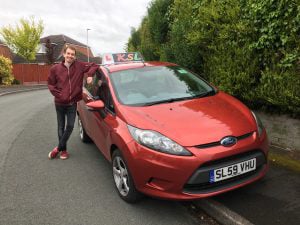 Image of Dan and his car