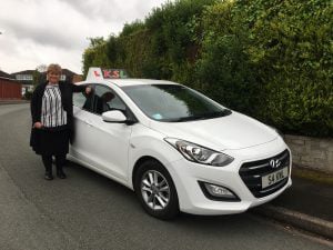 Image of Karen and her car