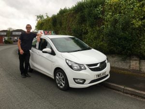 Image of Stewart and his car